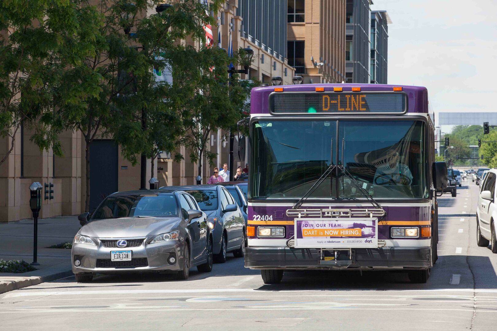 D-Line bus driving in Downtown Des Moines.